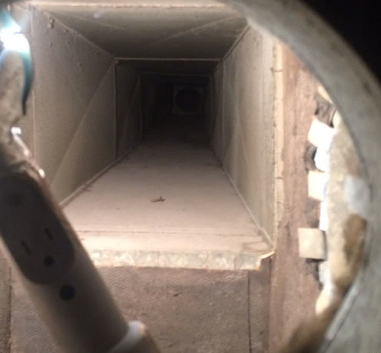A square duct run before cleaning
